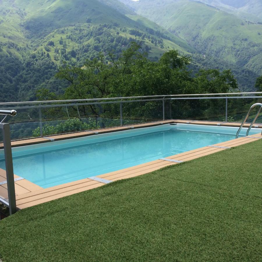 Chalet Con Piscina Garzeno Exterior foto