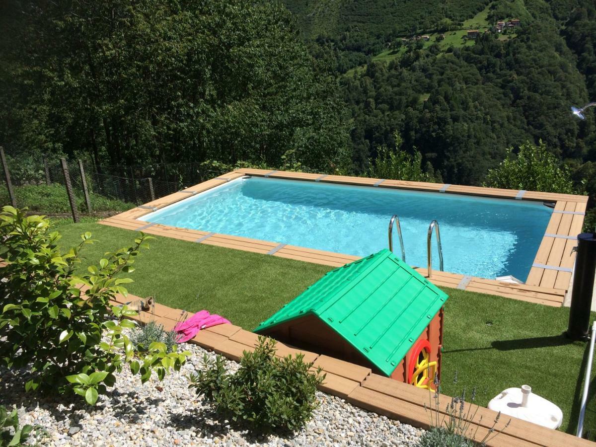 Chalet Con Piscina Garzeno Exterior foto