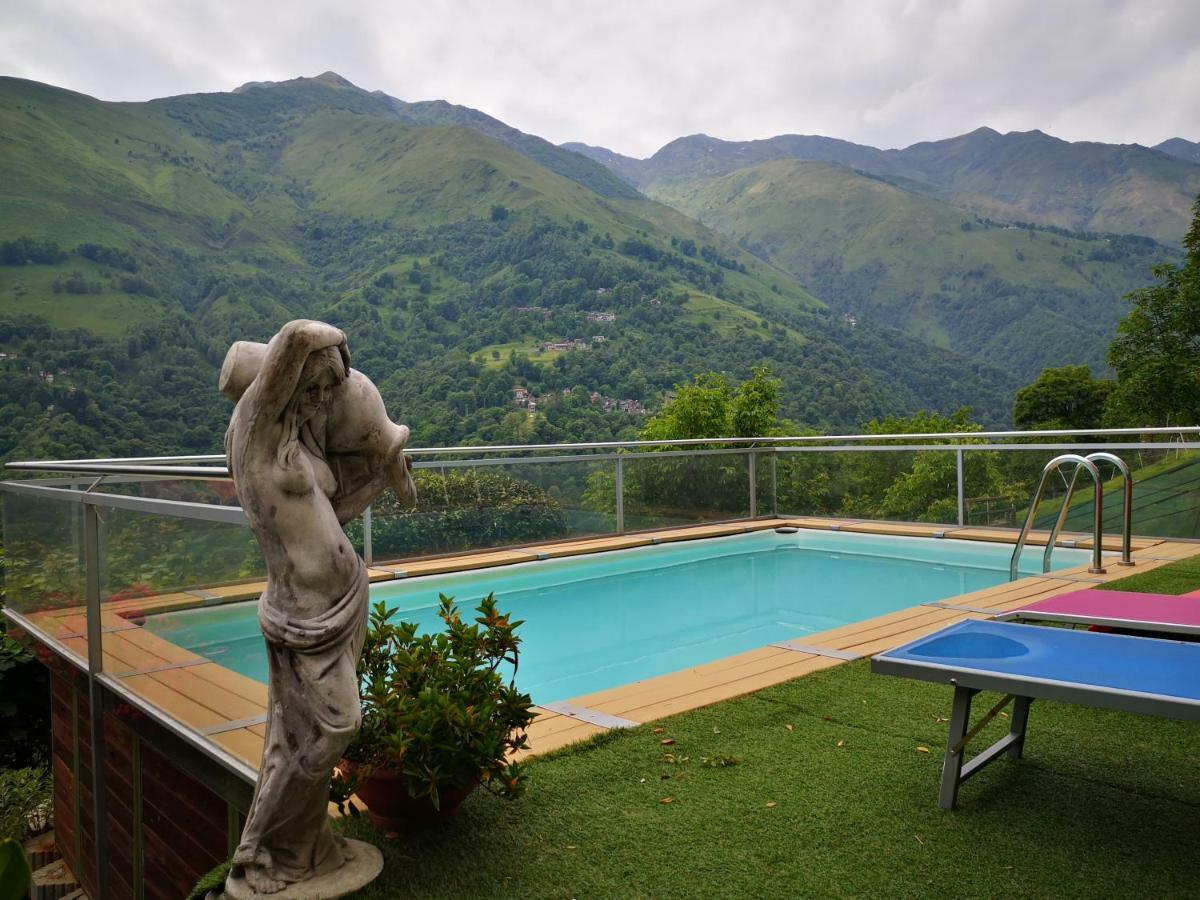 Chalet Con Piscina Garzeno Exterior foto